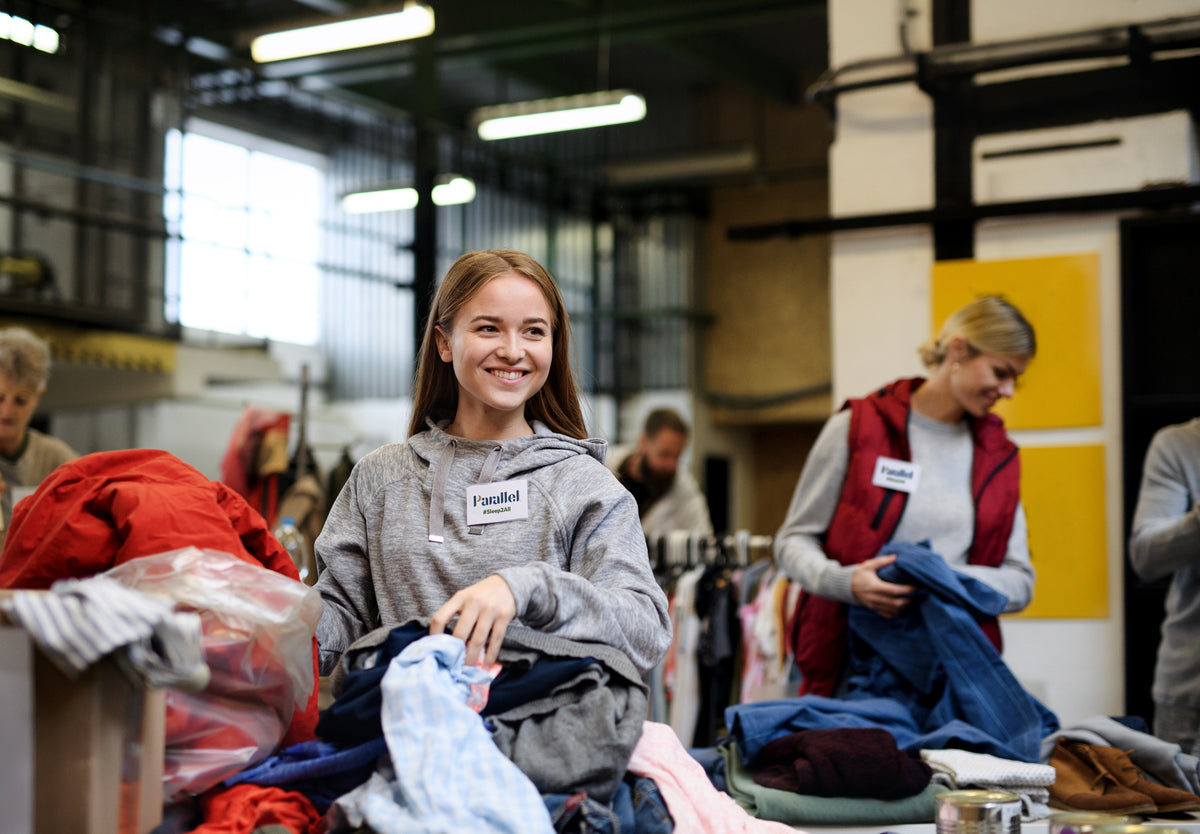 Community volunteers at donation center working for charity