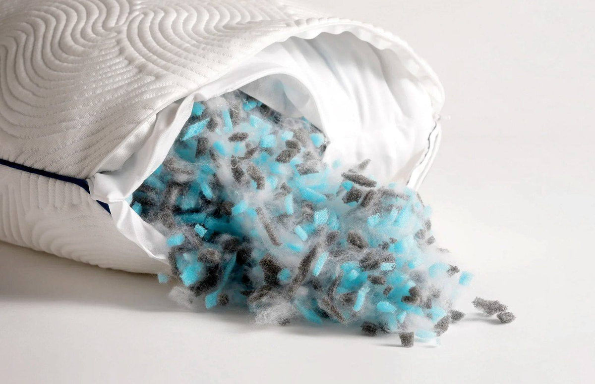 Parallel Pillow fill spilling out open zipper.